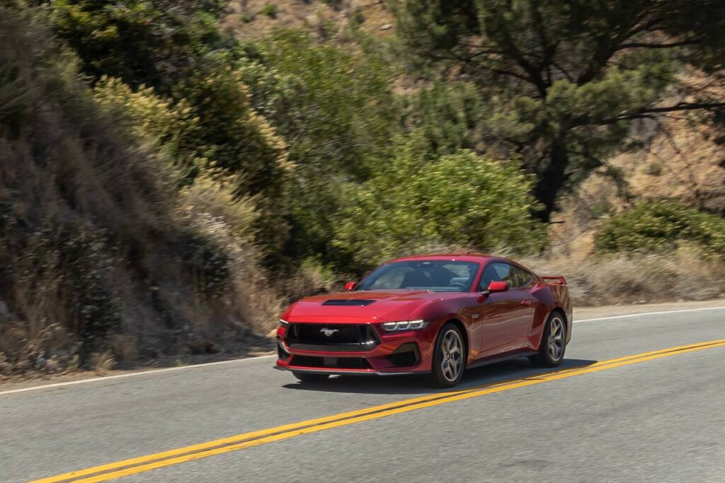 ford-mustang-gt-2024-80-exterior-dynamic-front-angle-red